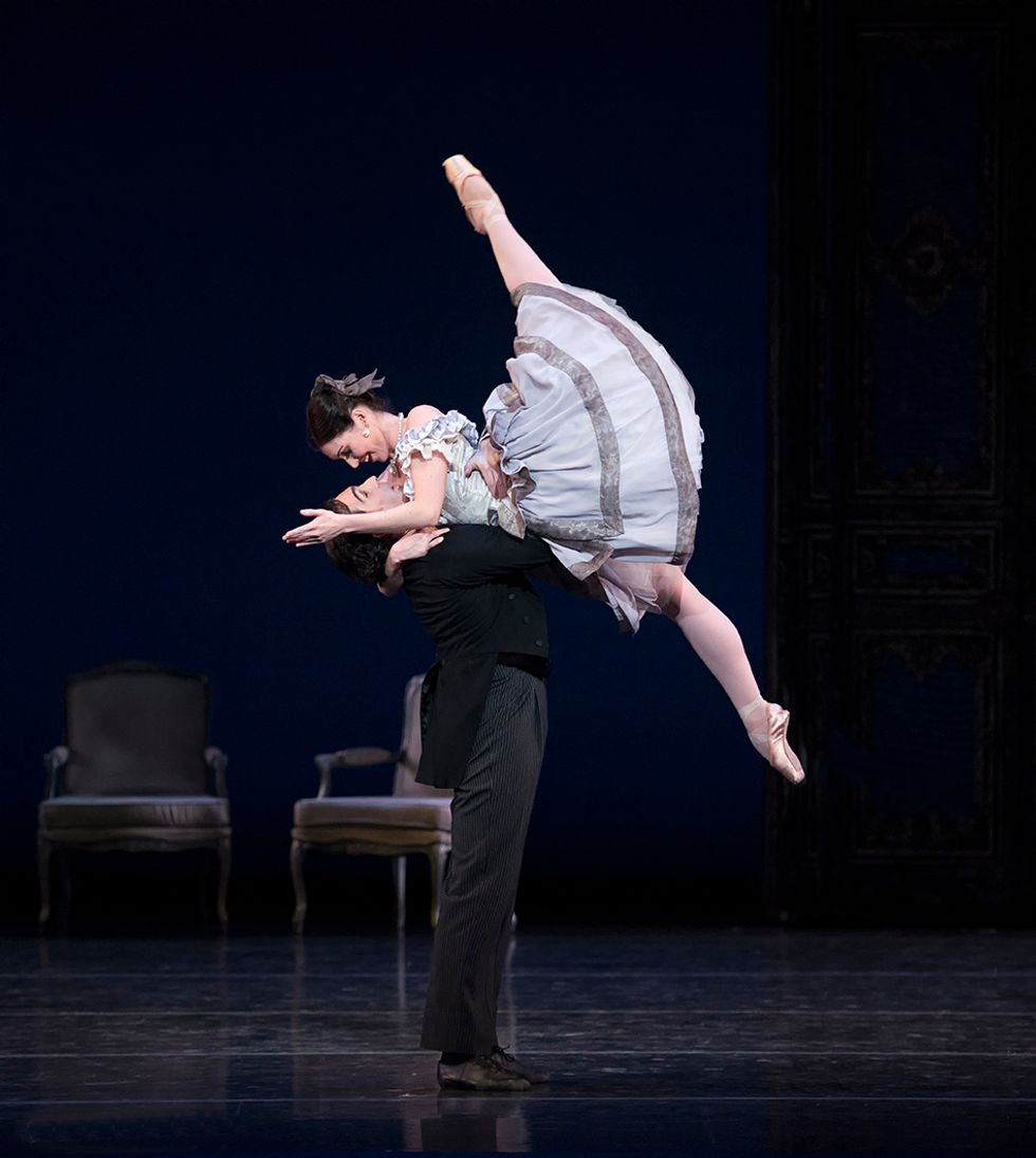 Kathleen Breen Combes is swept up into Yury Yanowsky's arms, her legs in a wide split