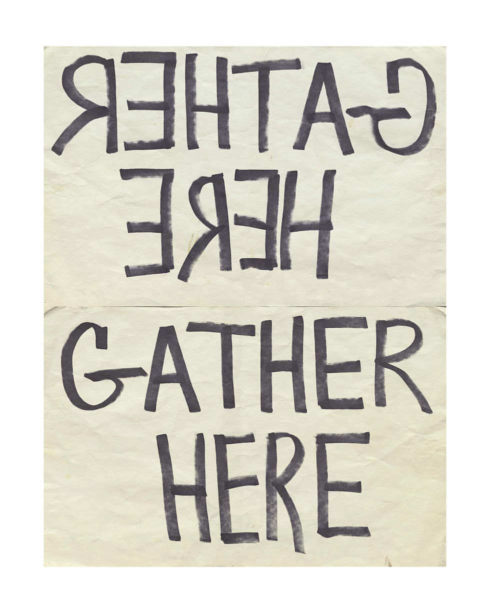 The words "GATHER HERE" seen backwards then forwards