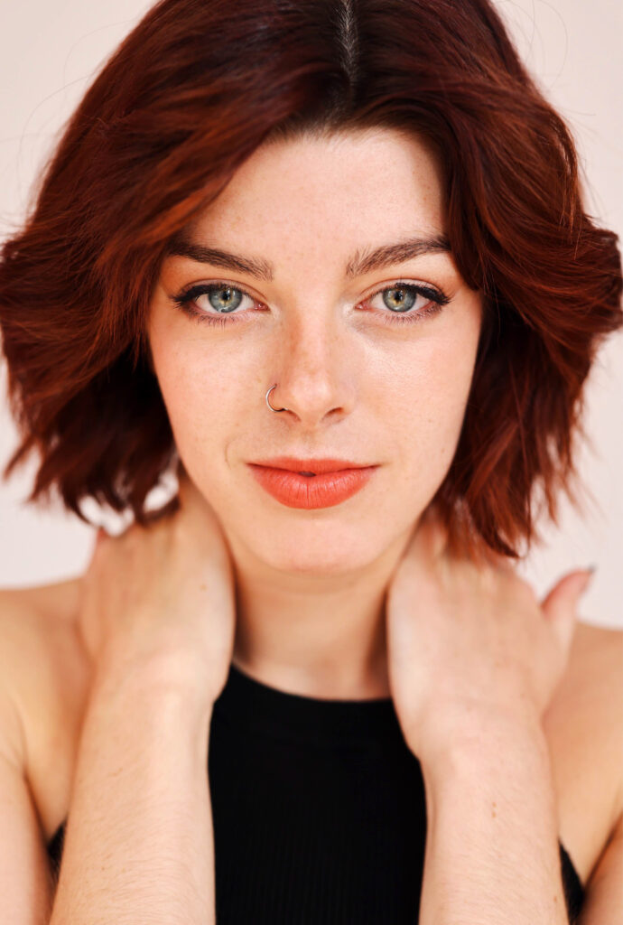 a woman with a brown bob looking at the camera for a headshot 