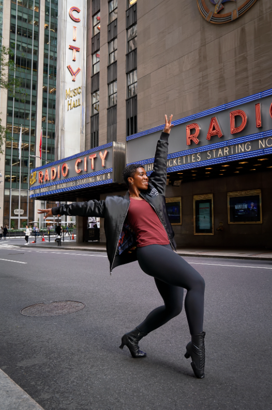 Karmen Moore dancing outside of the Radio City Music Hall