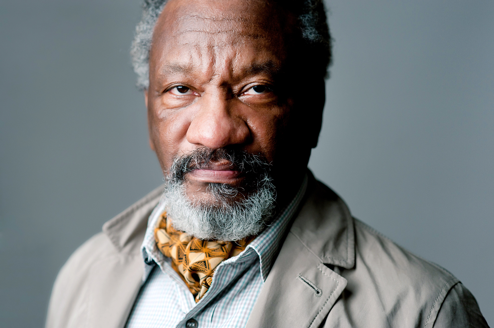 Donald Byrd's headshot. He wears a jacket and button down shirt.